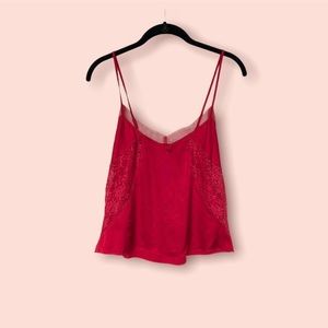 Stunning ruby red satin camisole tank top with lace panels and mesh detailing.